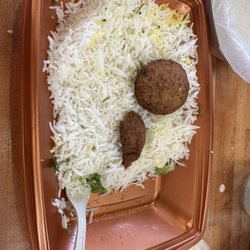 Moby Dick House of Kabob - This is the falafel platter that I threw in the trash.  The rice was flavorless and the falafel dry.  Also threw out half of the pita. Ugh.