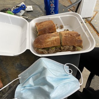 Oriens Cafe - ONE Philly sub, with a piece already eaten - Italian Near Me - Rochester, New York Oriens Cafe - ONE Philly sub, with a piece already eaten - Italian Near Me - Rochester, New York