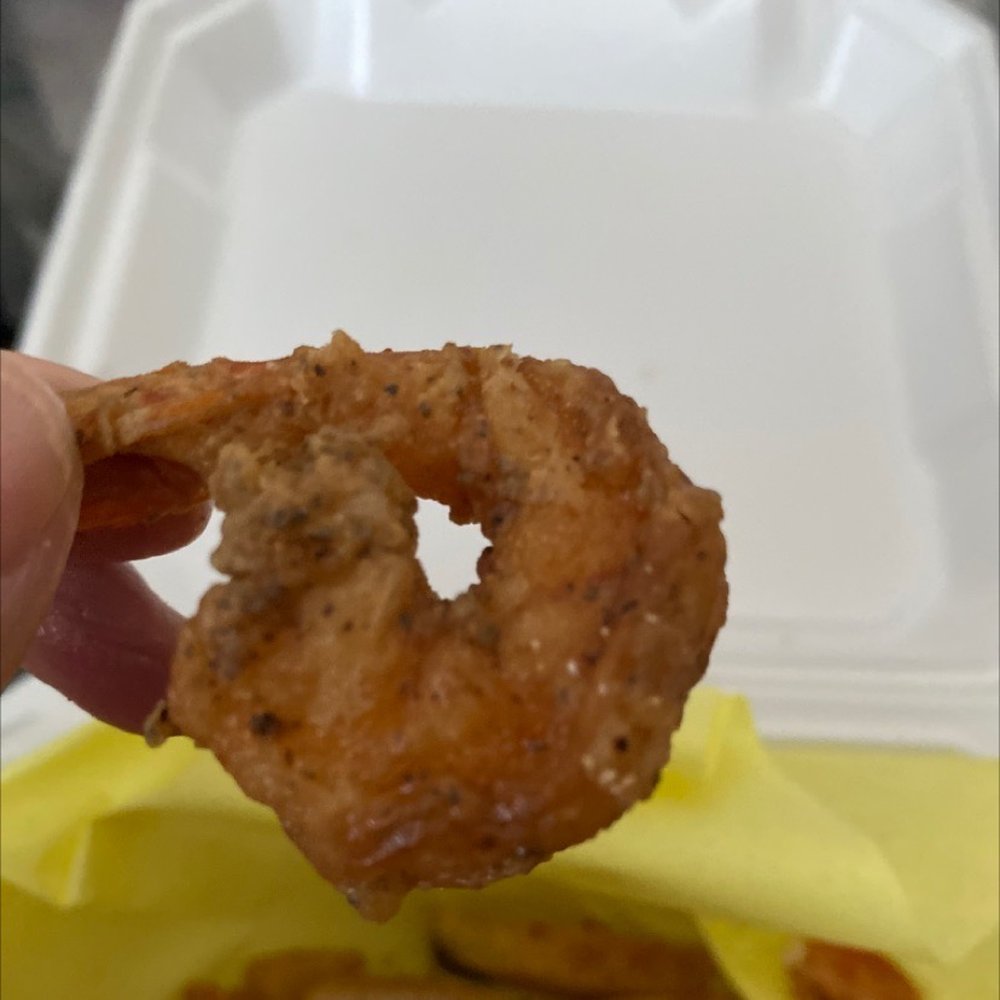 Worst shrimp ever..severely overcooked in old oil Worst shrimp ever..severely overcooked in old oil