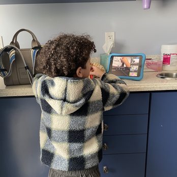 That Broadway Smile - Allowed my son to stand freely and go on his iPad. - Pediatric Dentists Near Me - Massapequa, New York That Broadway Smile - Allowed my son to stand freely and go on his iPad. - Pediatric Dentists Near Me - Massapequa, New York