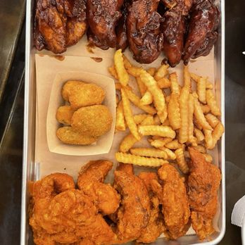 Wings Cafe - Westport - Two different tenders, fries, jalapeño poppers - Chicken Wings Near Me - Kansas City, Missouri Wings Cafe - Westport - Two different tenders, fries, jalapeño poppers - Chicken Wings Near Me - Kansas City, Missouri