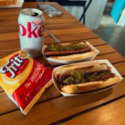 Cow Dog - Your basic hot dog with sweet relish. Add Fritos and soda for a complete dining experience.