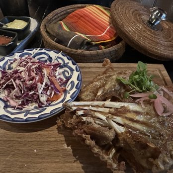 Don Artemio - Costillas de Cabrito: Fried tender cabrito ribs, oregano pickled red onion, tomato and cabagge salad. - Mexican Near Me - Fort Worth, Texas Don Artemio - Costillas de Cabrito: Fried tender cabrito ribs, oregano pickled red onion, tomato and cabagge salad. - Mexican Near Me - Fort Worth, Texas
