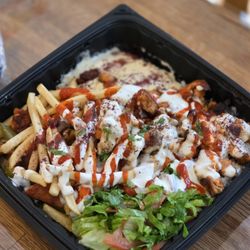 King of shawarma & kabob - Chicken shawarma plate. Has some spice to it (red sauce)