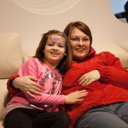 WorldWide Furniture - After a fancy face painting session, what's better than a cuddle on a sofa?!