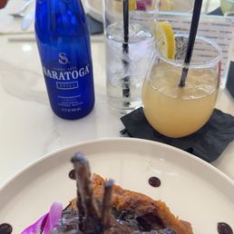 Bottled water, watermelon lemonade & jerk lamb chops