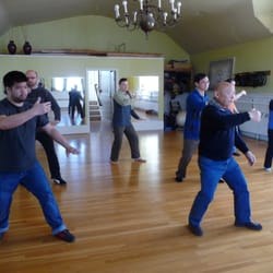 Swimming Dragon Tai Chi - Master Fong Ha ( front right) & Randy Moy (Front Left)