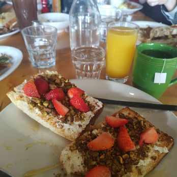 The Roost - juice, tea, and foccoia bread with ricotta cheese - Breakfast & Brunch Near Me - Indianapolis, Indiana The Roost - juice, tea, and foccoia bread with ricotta cheese - Breakfast & Brunch Near Me - Indianapolis, Indiana
