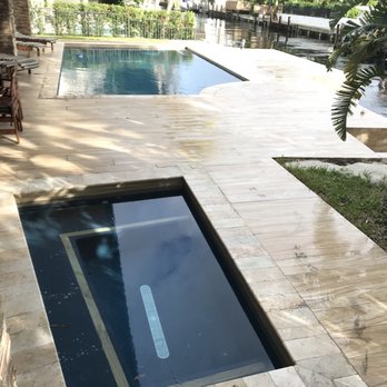 Apex Paver Concepts - Tile like wood deck and travertine coping plus Hawaiian blue diamond Brite - Masonry/Concrete Near Me Apex Paver Concepts - Tile like wood deck and travertine coping plus Hawaiian blue diamond Brite - Masonry/Concrete Near Me