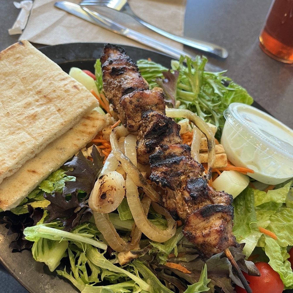 Sticks Kebob Shop - Salad with 1 stick, grilled pork, and cilantro dressing. - Mediterranean Near Me - Richmond, Virginia Sticks Kebob Shop - Salad with 1 stick, grilled pork, and cilantro dressing. - Mediterranean Near Me - Richmond, Virginia