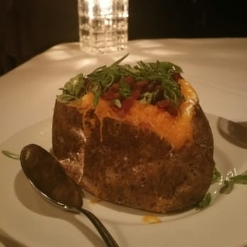 Rare Steakhouse - Stuffed baked potato - Steakhouses Near Me - Madison, Wisconsin Rare Steakhouse - Stuffed baked potato - Steakhouses Near Me - Madison, Wisconsin