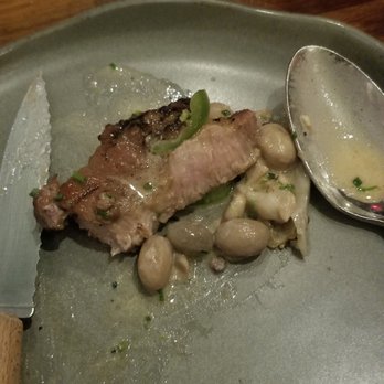 Olmsted - Pork collar with beans and escarole. (not the most flattering pic but very delicious) - New American Near Me - Brooklyn, New York