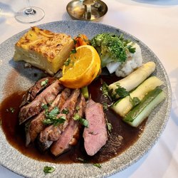 Le Canard - Duck a la orange with scalloped potatoes and steamed vegetables
