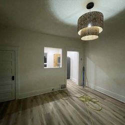 Diamond King Roofing & Contruction - New flooring with light fixture