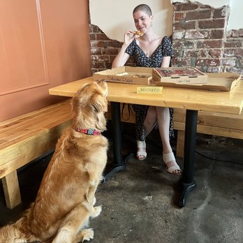 Monkey’s Bar - a woman and her dog eating pizza - Beer Bar Near Me - Knoxville, Tennessee Monkey’s Bar - a woman and her dog eating pizza - Beer Bar Near Me - Knoxville, Tennessee