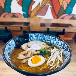 Kailani Shave Ice & Ramen - Vegetarian miso broth with steamed white fish cake, sliced pork belly, a perfectly soft boiled egg, bean sprouts &  bamboo shoots.