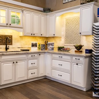 Trademark Kitchens, Baths, & Remodeling - a kitchen with white cabinets - Flooring Near Me - Houston, Texas Trademark Kitchens, Baths, & Remodeling - a kitchen with white cabinets - Flooring Near Me - Houston, Texas