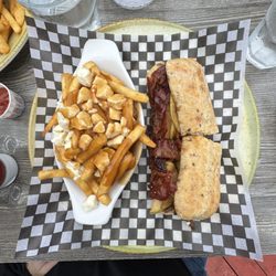 Micro-Brasserie le Brouemont - Le Brouemont - Their outstanding Duck Lake Brome Sandwich with Brie, Bacon, Caramelized Apples on Multigrain Baguette and a side of Poutine