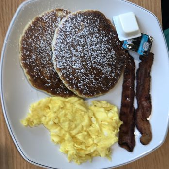 Eggs Up Grill - burnt pancakes and a thin layer of eggs. - Breakfast & Brunch Near Me - Summerville, South Carolina Eggs Up Grill - burnt pancakes and a thin layer of eggs. - Breakfast & Brunch Near Me - Summerville, South Carolina