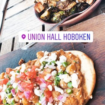 Union Hall - a pizza and a plate of vegetables - Gastropubs Near Me - Hoboken, New Jersey