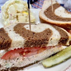 Tuna salad sandwich on rye bread, side of potato salad. The best tuna salad sandwich I have ever eaten!