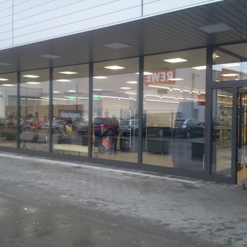 Aldi - Neue Außenfassade mit Blick auf den neuen Ruhebereich mit neuem Kaffee-Automaten - Grocery Near Me - Bad Vilbel, HE
