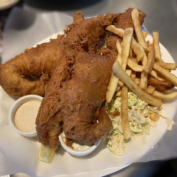 Yard House - OMG, I don't know if you can sense how huge this portion of fish and chips is. Everyone around us was commenting and laughing. - New American Near Me - Santa Clarita, California