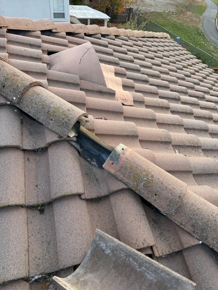 Slide of LXS Roofing