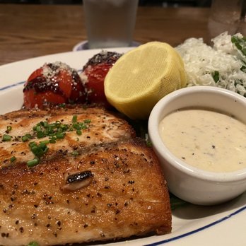 Hudson House - The Redfish with roasted whole tomatoes and a side salad. Very tasty! - American Near Me - Dallas, Texas Hudson House - The Redfish with roasted whole tomatoes and a side salad. Very tasty! - American Near Me - Dallas, Texas