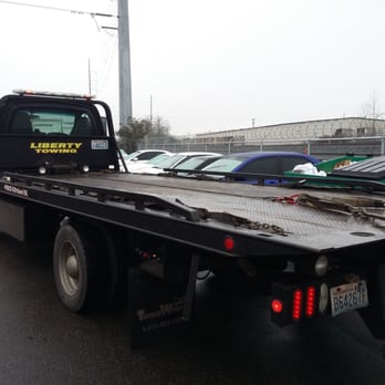 Liberty Towing - Flatbed used to tow my Nissan Frontier truck. - Towing Near Me - Tacoma, Washington Liberty Towing - Flatbed used to tow my Nissan Frontier truck. - Towing Near Me - Tacoma, Washington