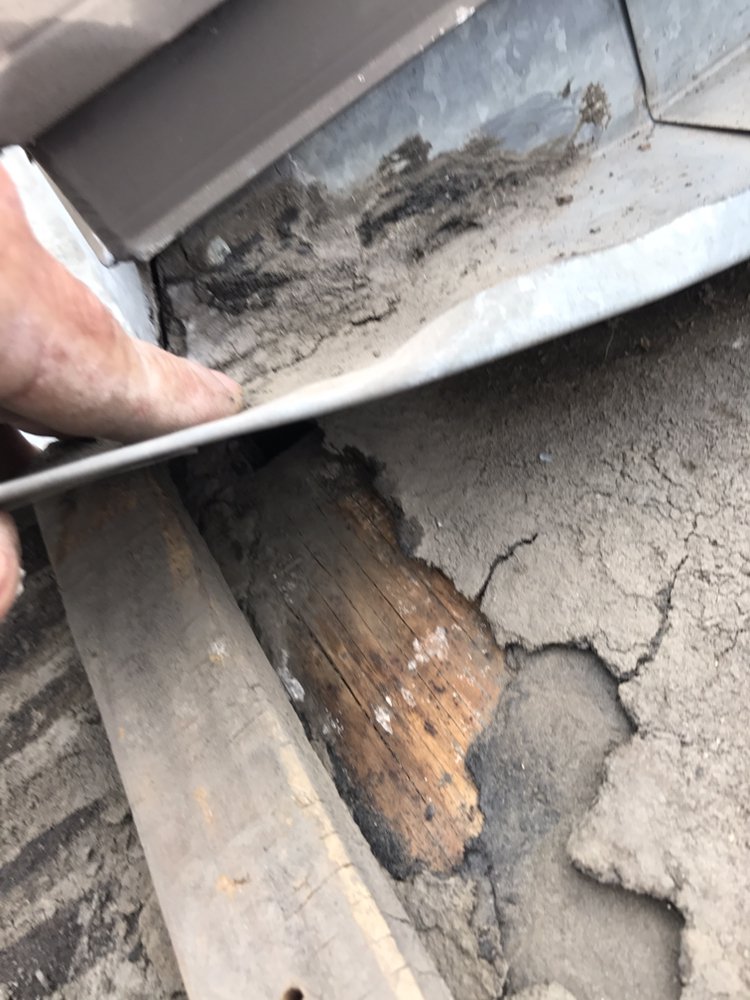 Slide of Century Roofing Company