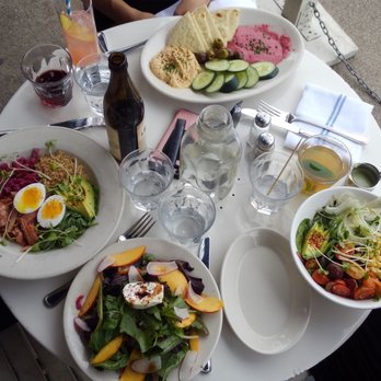 Oddfellows Cafe & Bar - Mezze plate, smoked salmon bowl, peach and buratta salad, corn and avocado salad (from top counter clockwise). - Breakfast & Brunch Near Me - Seattle, Washington