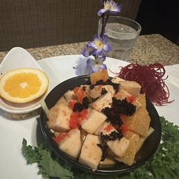 Orange Escolar, mix caviar ponzu and wasabi dressing Orange Escolar, mix caviar ponzu and wasabi dressing