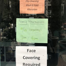 Green Sign on the door saying closed for maintenance