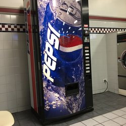 S C Cleaners & Laundry - $1 Pop Can Machine