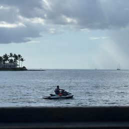 Watch boats and watersports from sunset pier Watch boats and watersports from sunset pier