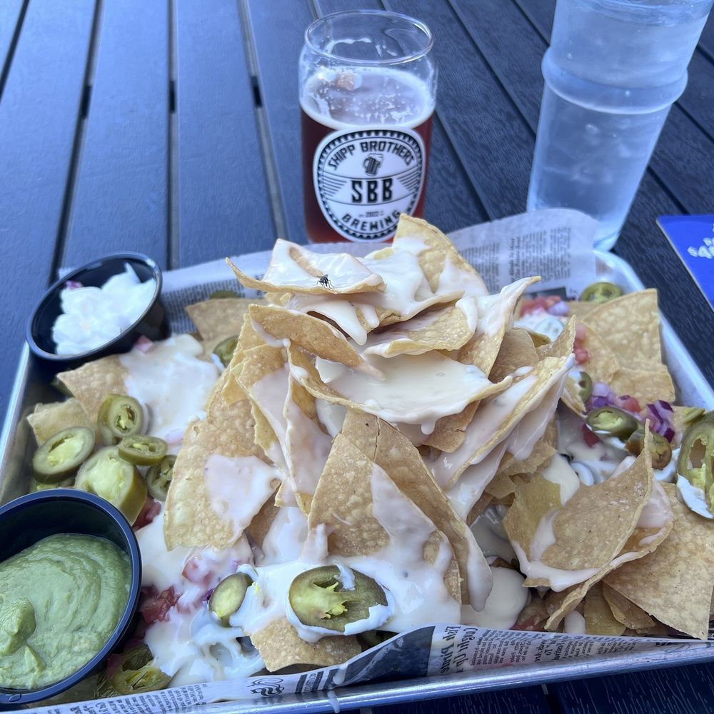 Shipp Brothers Brewing Restaurant & Taproom - Shareable nachos are half-price on happy hour. They are good but somewhat lackluster. You can pay to add chicken, but I didn't want that. - Brewpubs Near Me - Newark, Ohio Shipp Brothers Brewing Restaurant & Taproom - Shareable nachos are half-price on happy hour. They are good but somewhat lackluster. You can pay to add chicken, but I didn't want that. - Brewpubs Near Me - Newark, Ohio