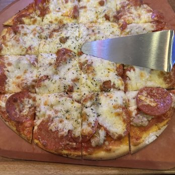 Flo & Santos - Sausage and pepperoni 12" Thin Crust Pizza - Pizza Near Me - Chicago, Illinois Flo & Santos - Sausage and pepperoni 12" Thin Crust Pizza - Pizza Near Me - Chicago, Illinois