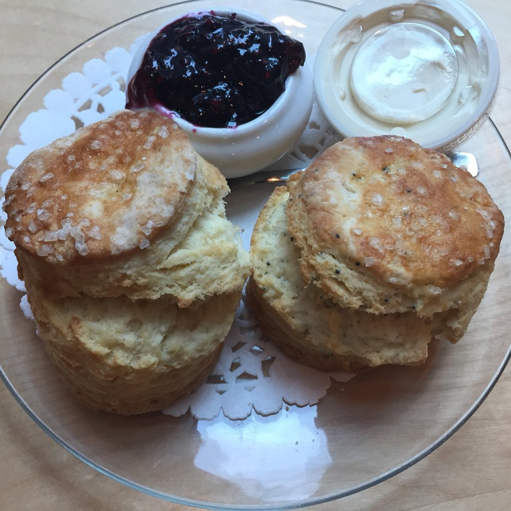 The SconeWitch - Vanilla-cream scone ($2.60+tax) and Lemon-poppyseed scone ($2.60+tax) with wild blueberry-raspberry jam and Devon cream - Cafes Near Me - Ottawa, Ontario The SconeWitch - Vanilla-cream scone ($2.60+tax) and Lemon-poppyseed scone ($2.60+tax) with wild blueberry-raspberry jam and Devon cream - Cafes Near Me - Ottawa, Ontario