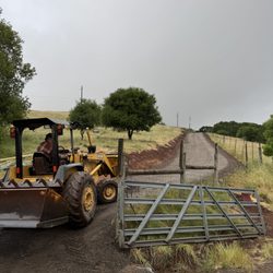 Demar - Putting the finishing touches on a beautiful new road going up the hill