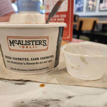 McAlister's Deli - 1.99 for that tiny cup of extra dressing.Told new charge. My husband brought it up and they laughed at him. 2 employees and the manager. - Sandwiches Near Me - Goodyear, Arizona McAlister's Deli - 1.99 for that tiny cup of extra dressing.Told new charge. My husband brought it up and they laughed at him. 2 employees and the manager. - Sandwiches Near Me - Goodyear, Arizona