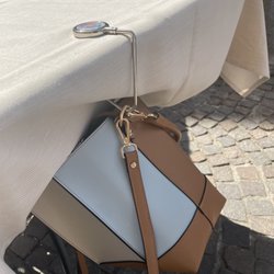 Barolando - The owner took care of my purse because as you know Italians never leave their purse on the dirty floor.