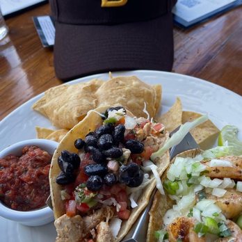 Duke's La Jolla - Chipotle Chicken Taco on the left, Togarashi Shrimp Taco on the right. - New American Near Me - La Jolla, California