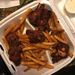 Fat Mo's - So gross. Please use fresh oil. I can smell how many times this was used before my wings were made. Fries are exceptional though.