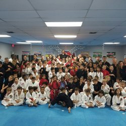 Karate America - Group picture of the kids and instructors from all the schools