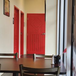 Darrell's Dog Gone Good Diner - Cutest barnyard bathroom doors!