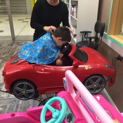 YCJ's Hair Studio - Kids haircut, you get to sit on a classy ride