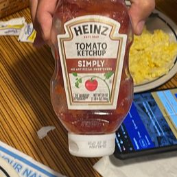 Empty and dirty ketchup bottle