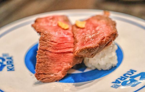 Kura Revolving Sushi Bar by null