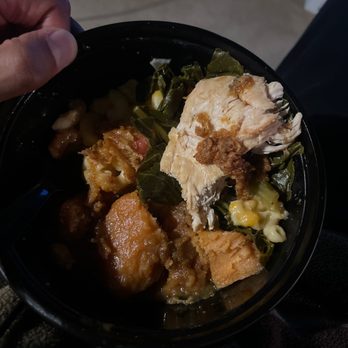 Soul To Go - a person holding a bowl of food - Soul Food Near Me - Columbus, Ohio Soul To Go - a person holding a bowl of food - Soul Food Near Me - Columbus, Ohio